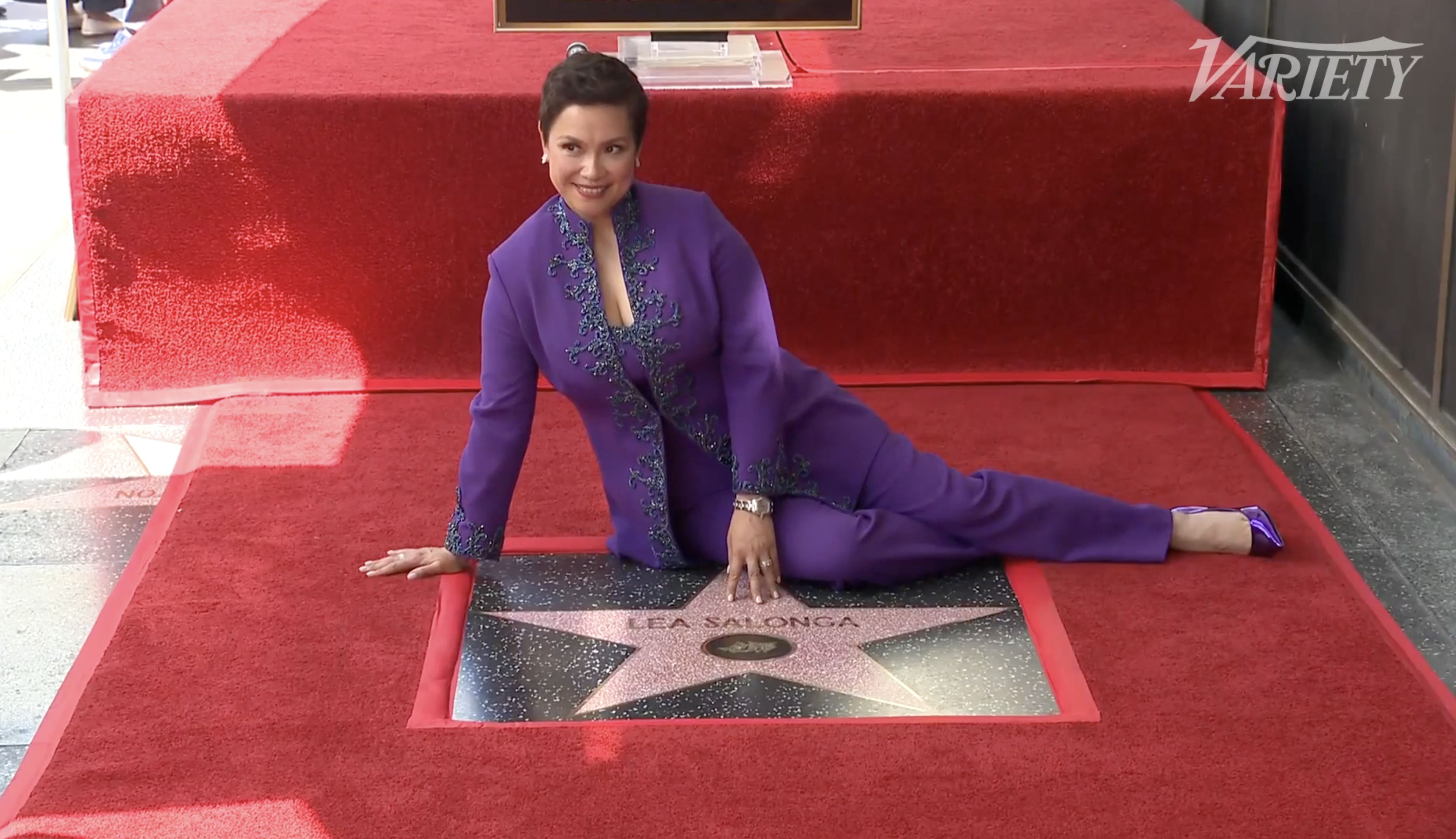 Posing with her own Walk of Fame Star in Hollywood for the first time, Lea Salonga is all smiles for the press.